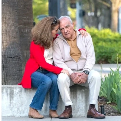 Caregiver family enjoying a supportive outdoor moment